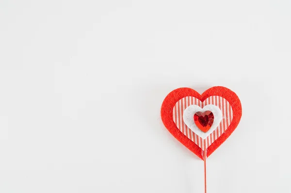 The heart of felt on a white background — Stock Photo, Image