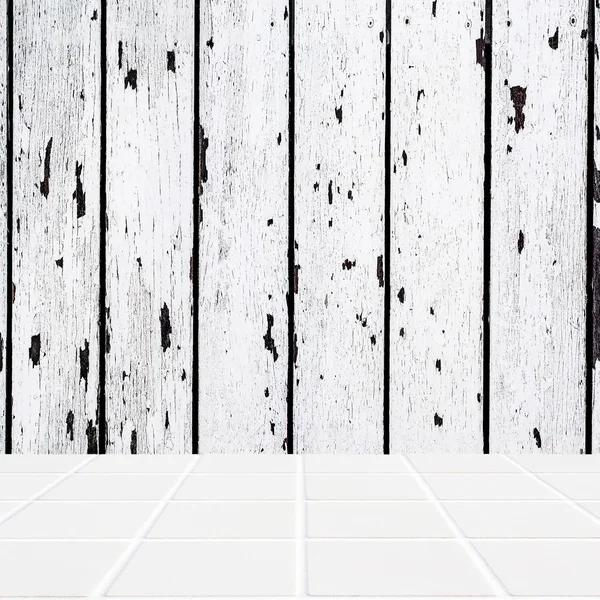 White ceramic mosaic floor and white wooden wall — Stock Photo, Image