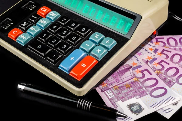 Contabilidad en calculadora de estilo retro — Foto de Stock