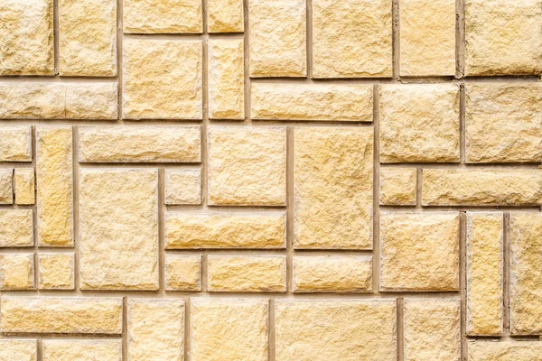 Muro di pietra marrone con linee di cemento grigio — Foto Stock