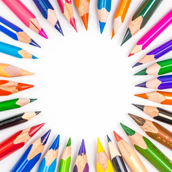 Bunch of different and multicolored pencils forming circle on white background — Stock Photo, Image