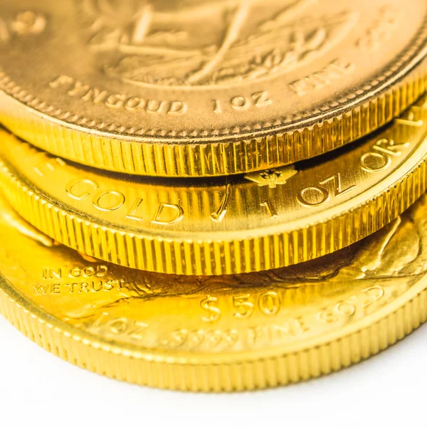 Drie een ounce gouden munten — Stockfoto