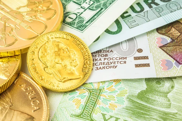 Value in gold of four world currencies — Stock Photo, Image