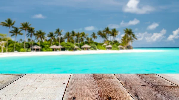 Combination of wooden front with blurred tropical island background — Stock Photo, Image