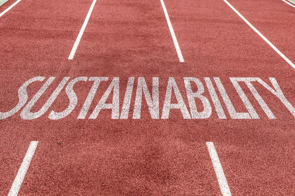 Sustentabilidade escrita na pista — Fotografia de Stock