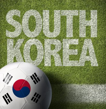 Bir futbol sahası içinde topa