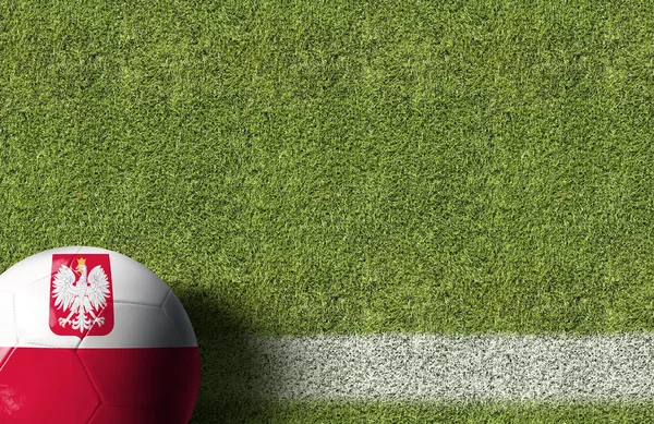 Мяч на футбольном поле — стоковое фото