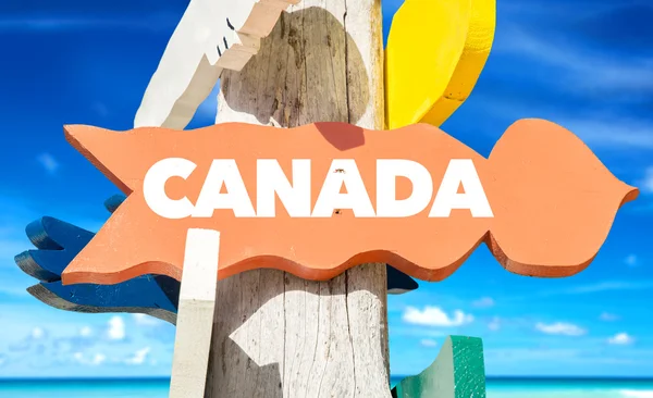 Kanada ukazatel s pláží — Stock fotografie