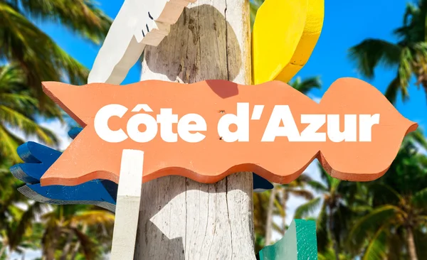 Cote d'Azur signpost with palm trees — Stock Photo, Image