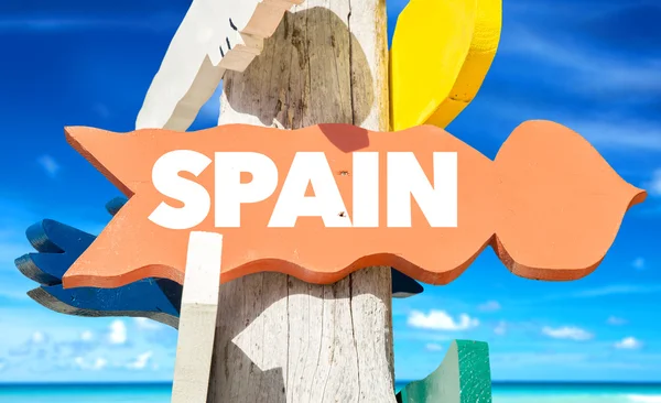 Spanje wegwijzer met strand — Stockfoto