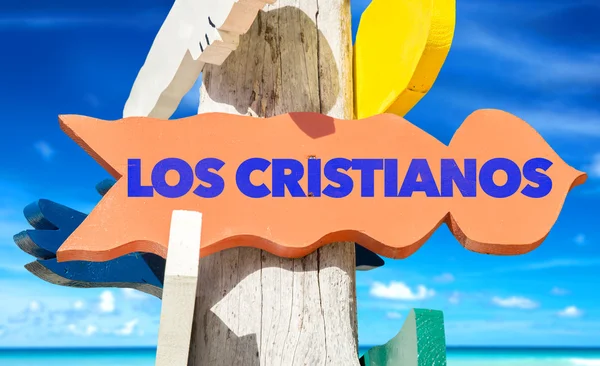 Los cristianos signpost com praia — Fotografia de Stock