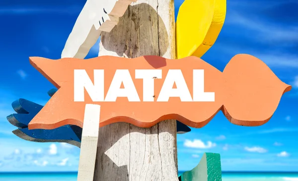 Natal wegwijzer met strand — Stockfoto