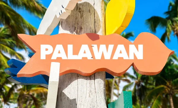 Palawan signpost with palm trees — Stock Photo, Image