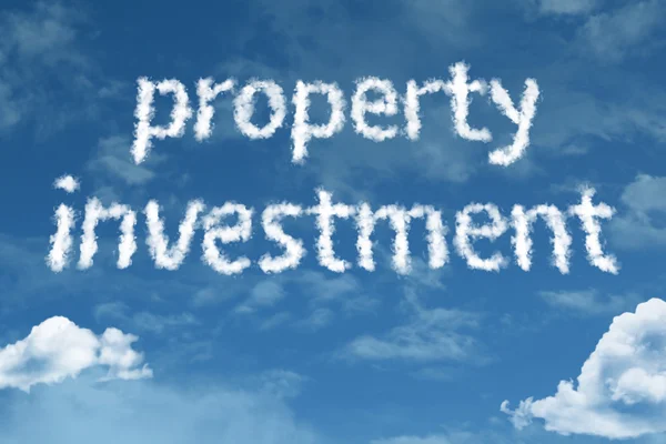 Investissement immobilier nuage mots avec ciel — Photo