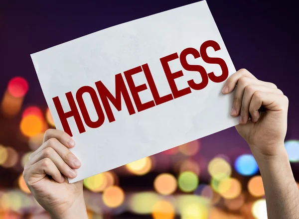 Homeless placard with night lights — Stock Photo, Image