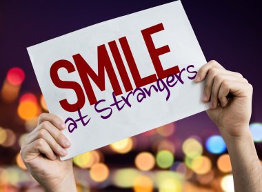 Smile At Strangers placard clipart