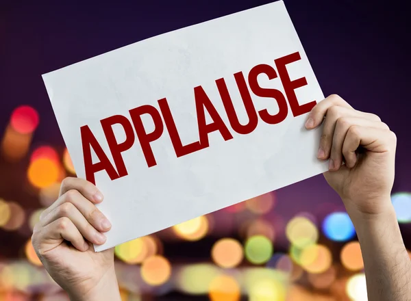 Applause placard with night lights — Stock Photo, Image