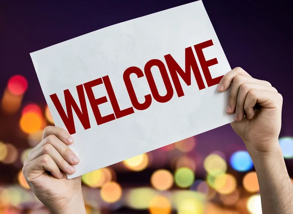 Welcome placard with night lights — Stock Photo, Image