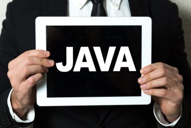 işadamı holding tablet ile metin