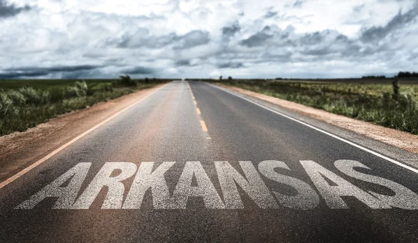 Arkansas texto na estrada — Fotografia de Stock