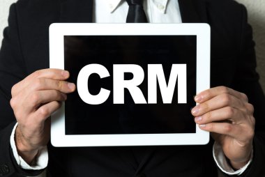 işadamı holding tablet ile metin