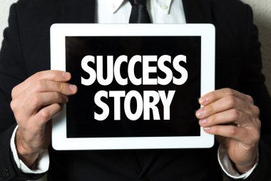 işadamı holding tablet ile metin