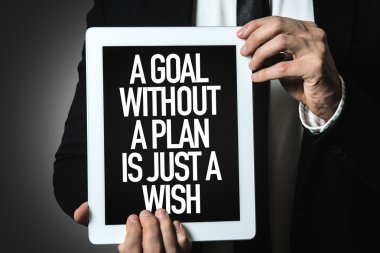 işadamı holding tablet ile metin