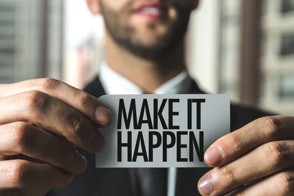 Businessman holding card with text — Stock Photo, Image