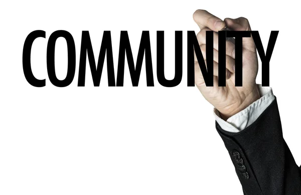 Hand writting the word community — Stock Photo, Image