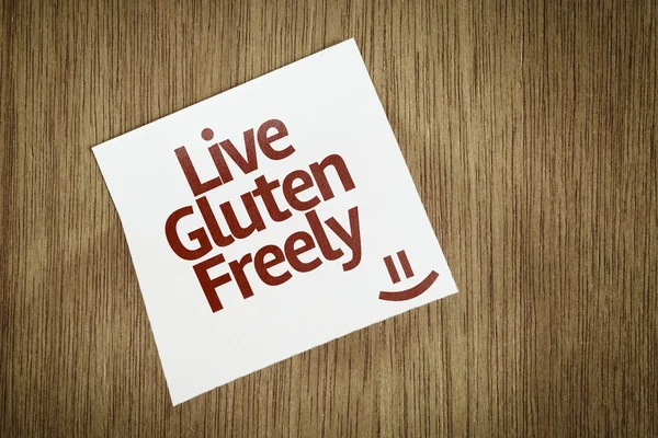 Live Gluten Freely en papel Nota sobre el fondo de textura — Foto de Stock