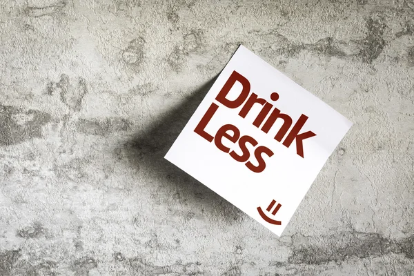 Drink Less on Paper Note on texture background — Stock Photo, Image