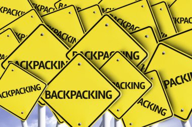 Backpacking written on multiple road sign clipart