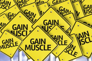 Gain Muscle written on multiple road sign clipart