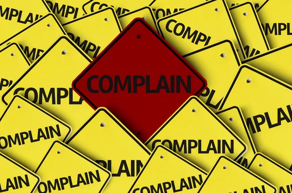 Complain written on multiple road sign — Stock Photo, Image