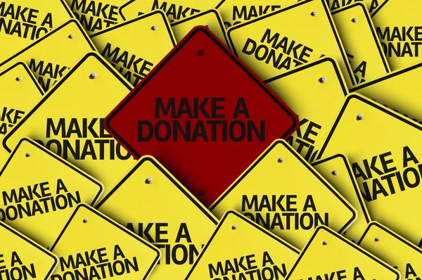 Hacer una donación escrita en múltiples señales de tráfico — Foto de Stock