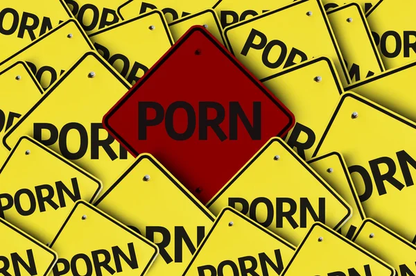 Porno escrito em sinal de estrada múltipla — Fotografia de Stock