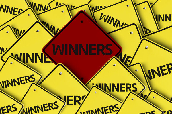 Winners written on multiple road sign