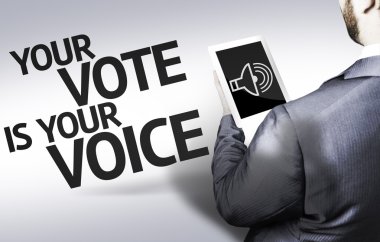 Business man with the text Your Vote is Your Voice in a concept image clipart