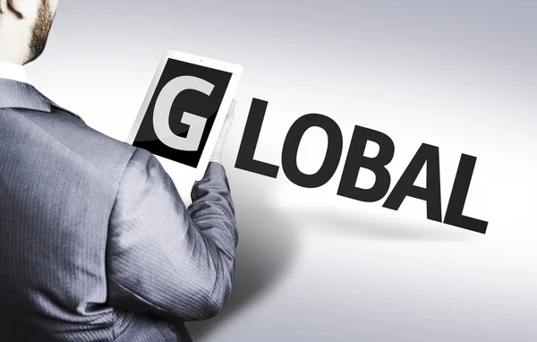 Business man with the text Global in a concept image — Stock Photo, Image
