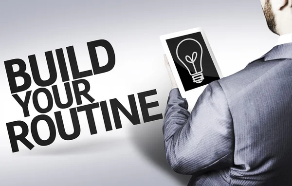 Business man with the text Build your Routine in a concept image — Stock Photo, Image