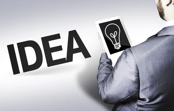 Hombre de negocios con el texto Idea en una imagen conceptual — Foto de Stock