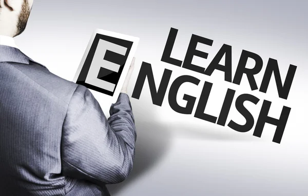 Uomo d'affari con il testo Impara l'inglese in un'immagine concettuale — Foto Stock