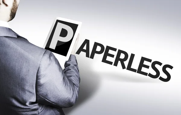 Affärsman med texten papperslös i en koncept-bild — Stockfoto