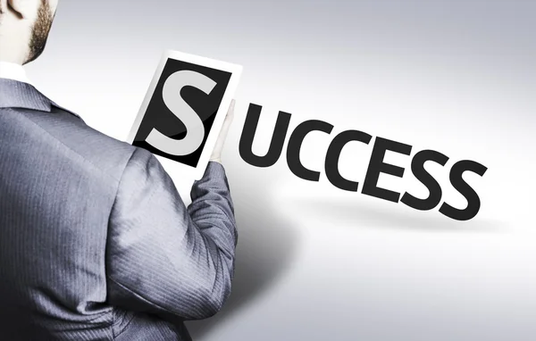 Business man with the text Success in a concept image — Stock Photo, Image