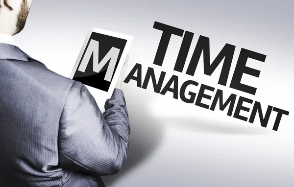 Бизнесмен с текстом Time Management в концептуальном образе — стоковое фото