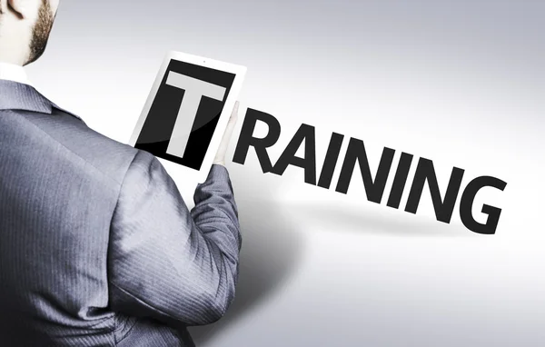 Business man with the text Training in a concept image — Stock Photo, Image