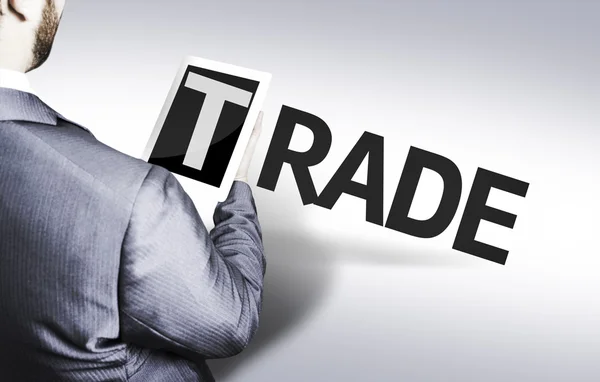 Business man with the text Trade in a concept image — Stock Photo, Image