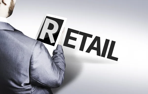 Uomo d'affari con il testo Retail in a concept image — Foto Stock