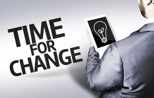 Hombre de negocios con el texto Tiempo para el cambio en una imagen conceptual — Foto de Stock