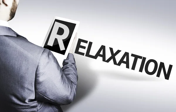 Homme d'affaires avec le texte Relaxation dans une image concept — Photo